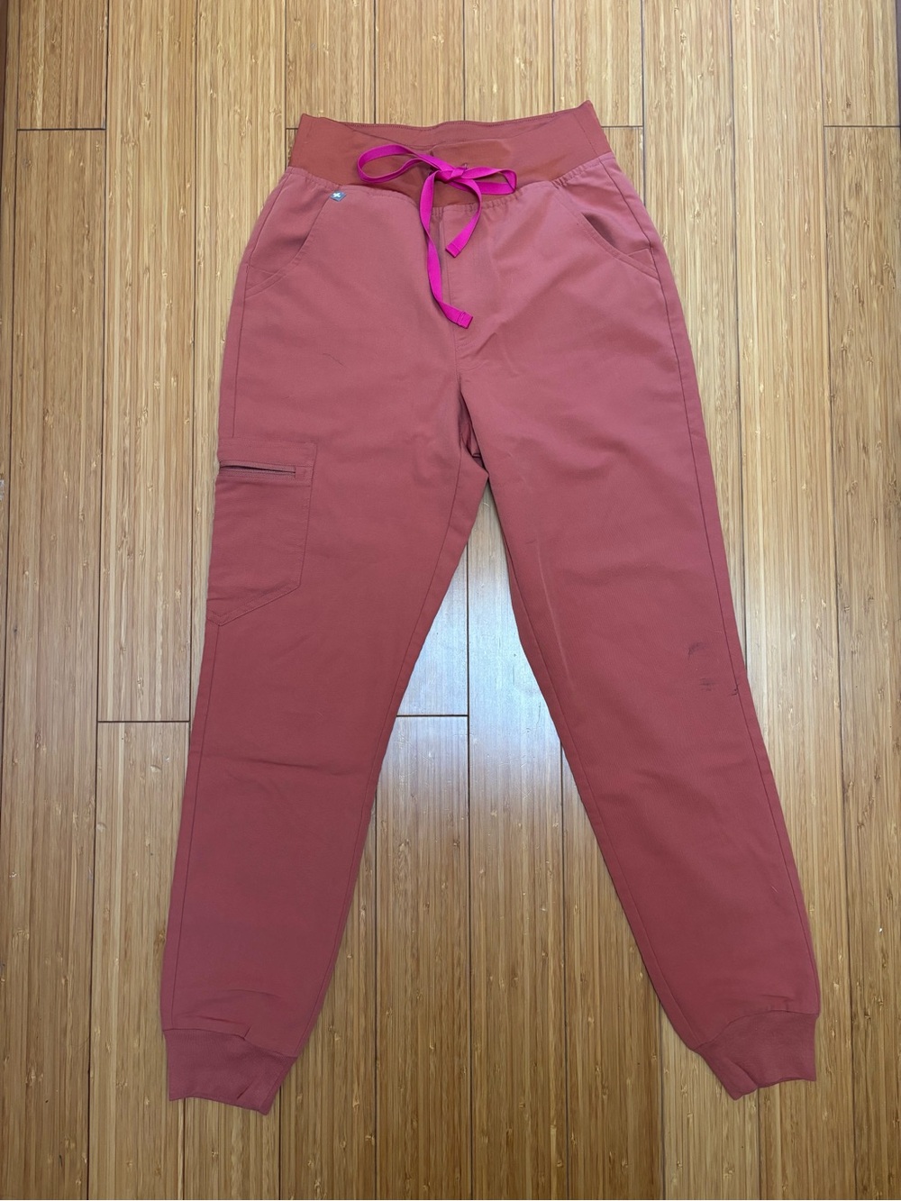 Fig’s Burnt Orange Jogger Scrub Pants with Fuchsia Drawstring